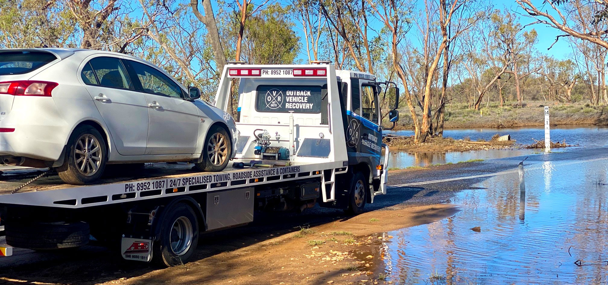 Towing white car - Outback Vehicle Recovery Alice Springs